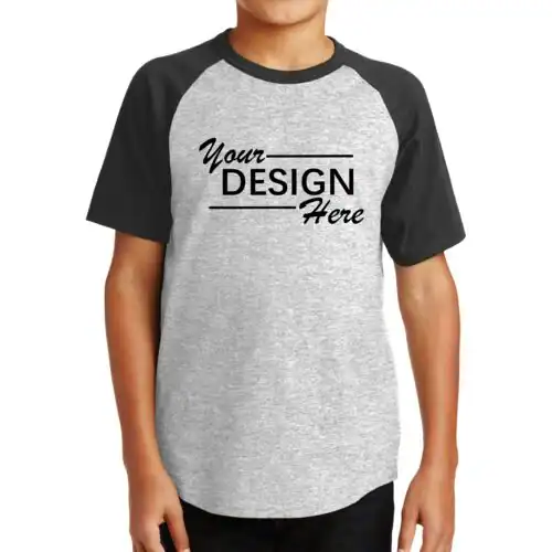 A child wearing a gray and black raglan t-shirt with "Your Design Here" printed in black on the front, perfect for NY style and custom T-Shirts Manhattan & Long Island.